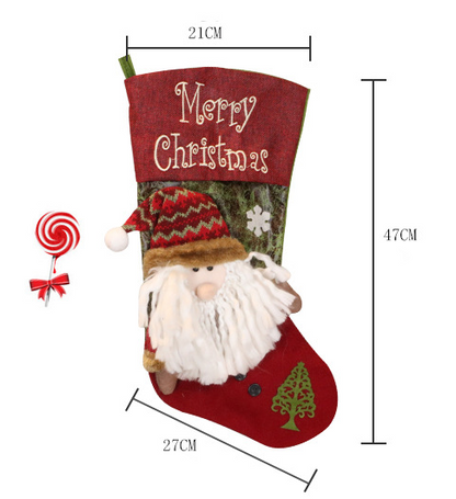 Maten van de kerstsok: 47 cm hoog, 21 cm breed bovenaan, voet 27 cm